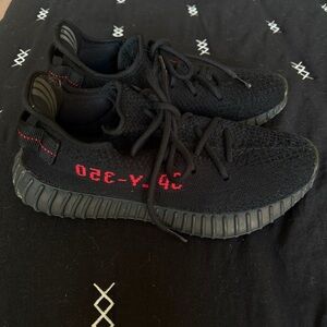 Yeezy Black and Red Athletic Shoes